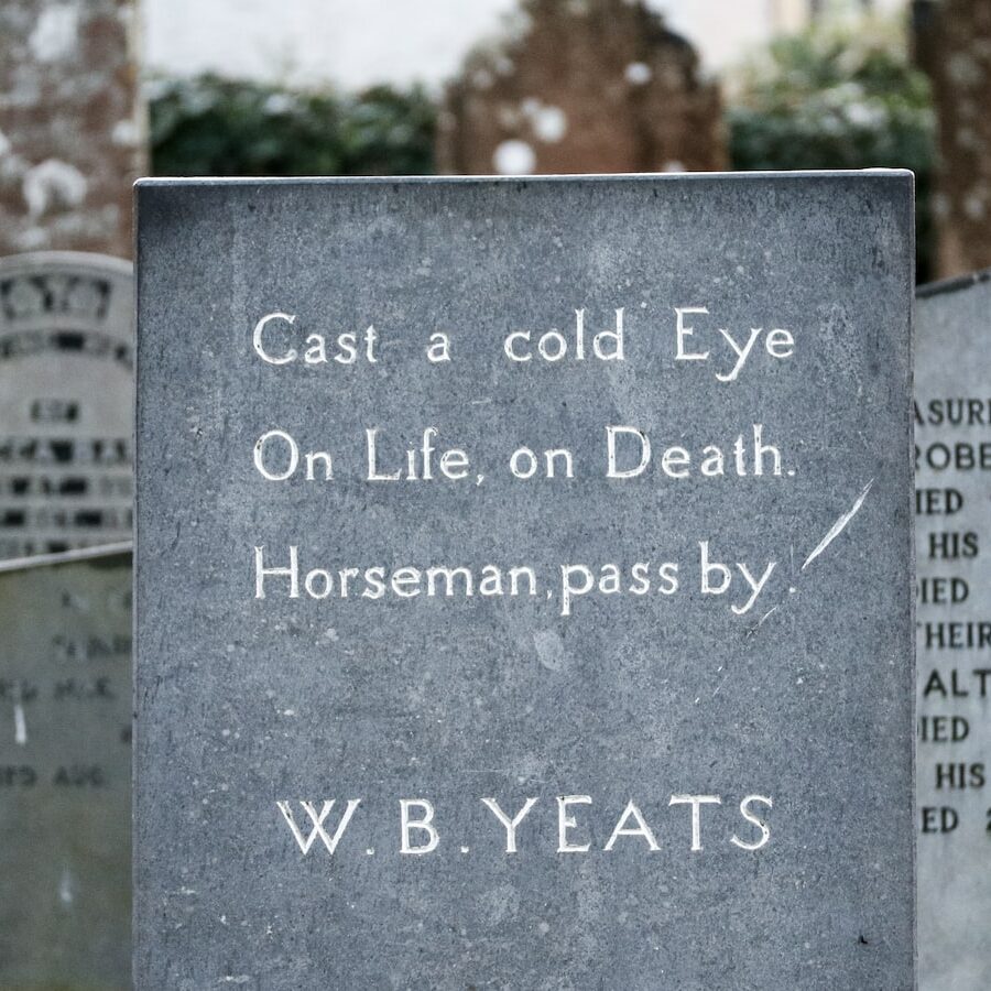 W.B. Yeats tombstone beside tombstones